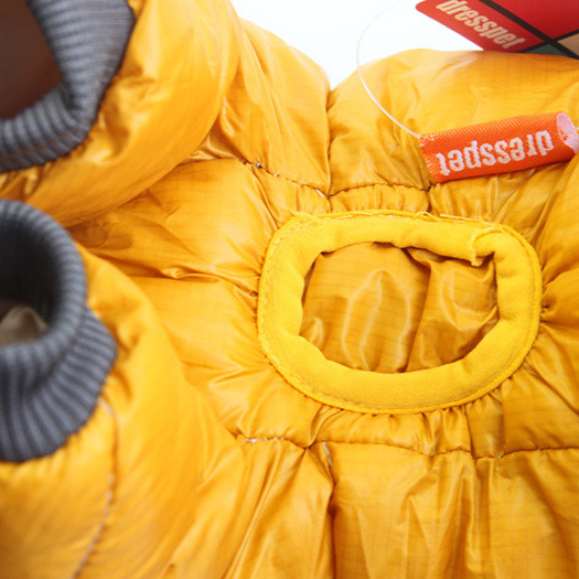 Close-up of yellow pet down jacket with open tummy