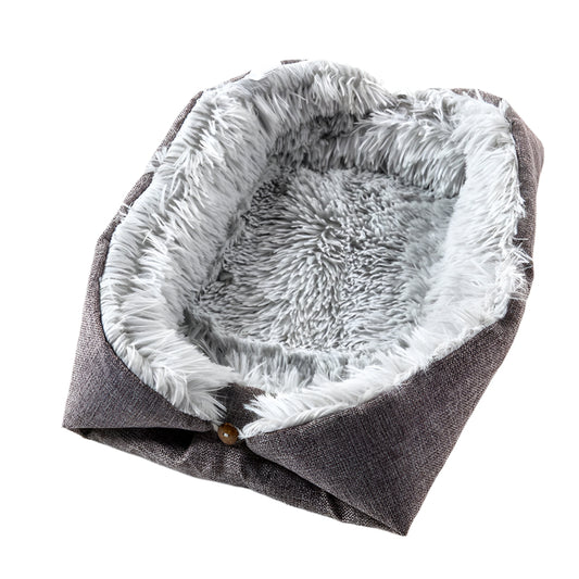 Foldable pet bed with dark gray exterior and fluffy light gray interior on a white background