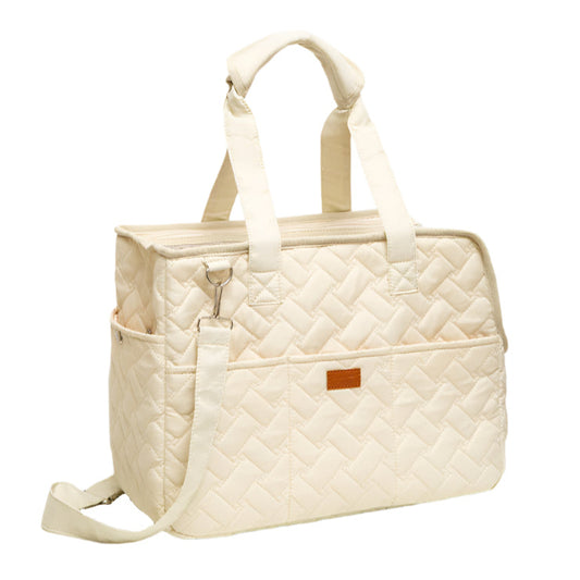 Quilted beige pet handbag on a white background